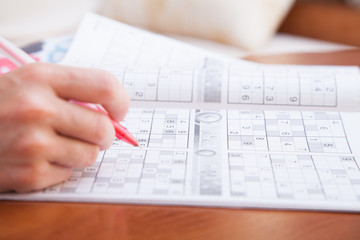 Crossword puzzle close-up.