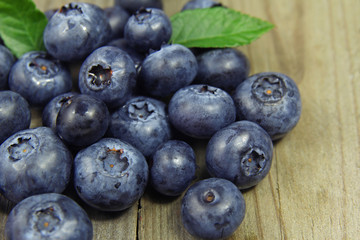 blueberries on wooden background