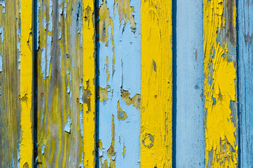 Old wooden fence with cracked paint
