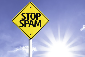 Stop Spam road sign with sun background