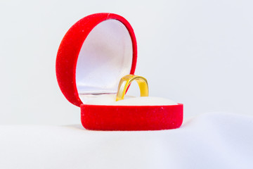 golden ring in red box