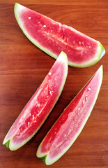 Watermelon on wooden table