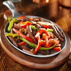 mexican food - beef fajitas and bell peppers