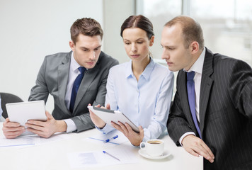 business team with tablet pc having discussion