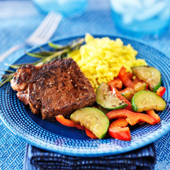 steak with vegetables and rice dinner