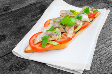 Bruschetta with tomato, sardines