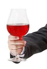 front view of red wine glass in male hand