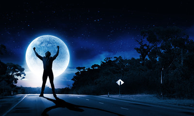 Man and full moon