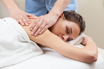 Fototapeta na wymiar Lady having back massage