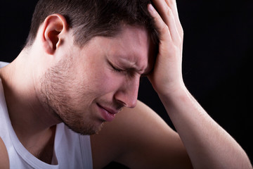 Fototapeta premium Man with strong migraine