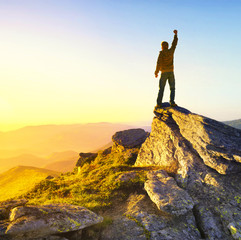 Obraz premium Champion on mountain top. Sport and active life concept