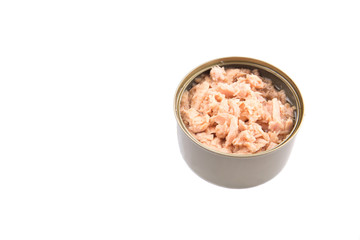 Pieces of tuna fish in a tin can over white background