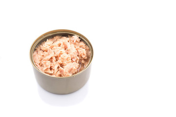 Fototapeta na wymiar Pieces of tuna fish in a tin can over white background