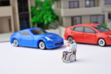 Fototapeta na wymiar 車椅子の介護と交通弱者