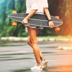 Fashion lifestyle, beautiful young woman with longboard. Lightle © arthurhidden