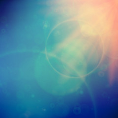 Abstract Sunset on sky with lenses flare.