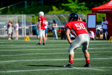 american football player with out of focus players