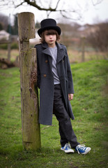 Boy in Long Coat and Top Hat