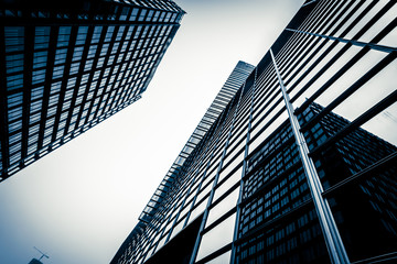 modern blue glass wall of skyscraper