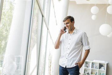 Fototapeta premium Young man in the office