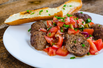 Meatballs with spicy tomato salsa