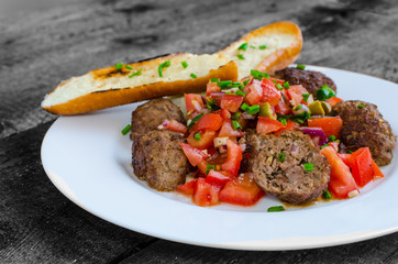 Meatballs with spicy tomato salsa