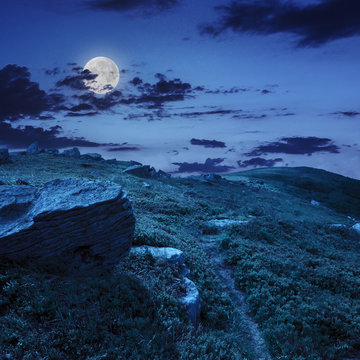 stones on the hillside at night