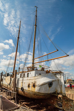 Large sailing boat in dock