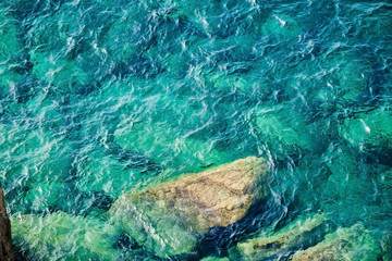 Rocky coast with clean blue see-through water. Cinque Terre Ital