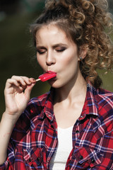 young beautiful girl eating ice cream