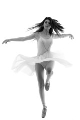 Graceful ballerina dancing en pointe