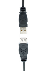 Two USB plugs almost connected isolated on a white background