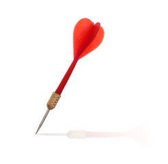 Red plastic dart with reflection on white background - target