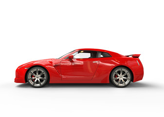 Fototapeta premium Fast red car side view