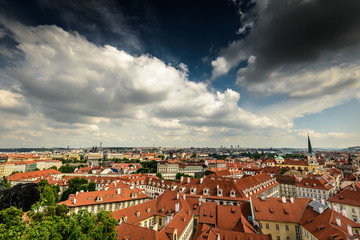Fototapeta na wymiar Photo of red tile rooftops and cloudy sky,Prague