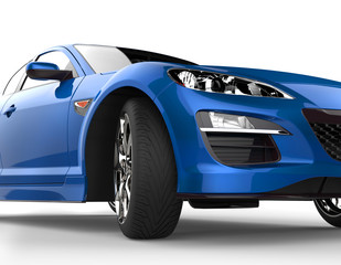 Obraz na płótnie Canvas Bright blue car extreme close-up