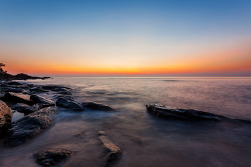 Naklejka premium Tropical beach at sunset.