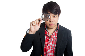 Asian man with magnifying glass