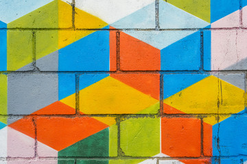 colourful square painted on grunge wall