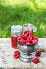 Raspberries in vintage silver goblet