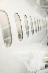 Passenger aircraft windows. View from outside. © M-Production