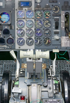 View of aircraft thrust lever in pilot's cabin.