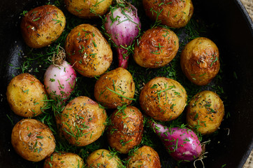 Homemade whole fried young potato and onion