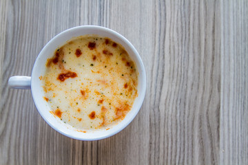 Traditional Turkish Yoghurt Soup in white bowl