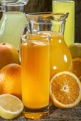 Orange juice and lemonade with orange, lemon and grapefruit