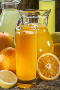 Orange juice and lemonade with orange, lemon and grapefruit