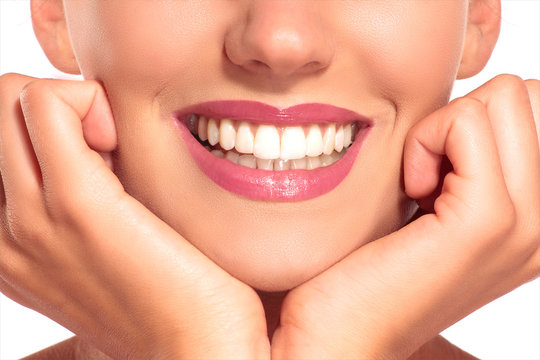 Closeup of smiling woman with perfect white teeth