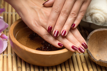 Hand care and manicure in the salon spa