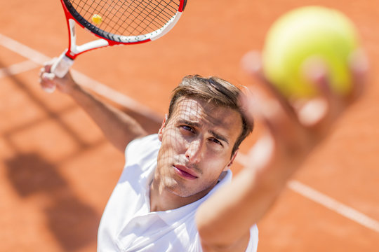 Young man playing tennis