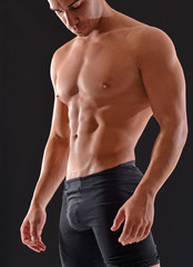 Fototapeta premium Musculoso hombre atleta deportista.